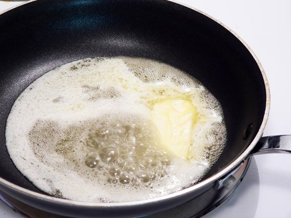 Melt some butter in the saucepan.