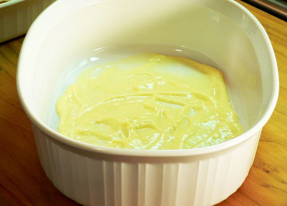 place a small amount of custard in your casserole style dish.