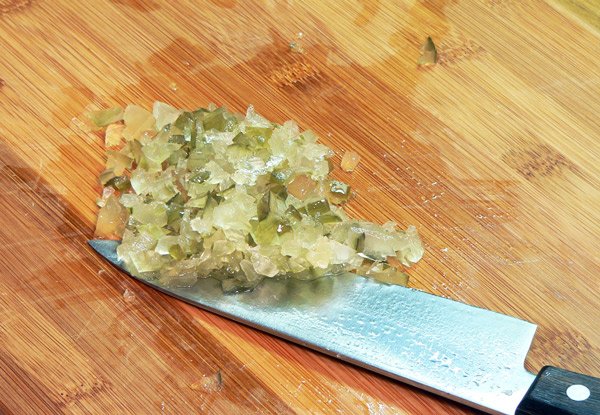 Chopped pickle pieces.