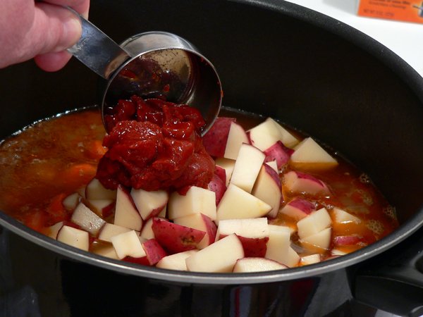Add the tomato paste.