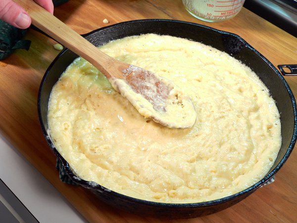 Gently spread the batter out to the edges.