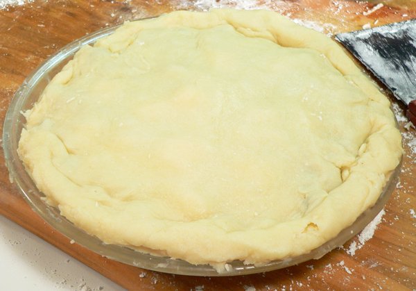Blueberry Pie, fold top crust under edge of the bottom crust.