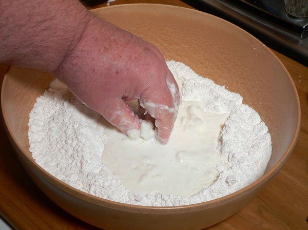 Mini Biscuits Recipe, stir the wet ingredients into the flour.
