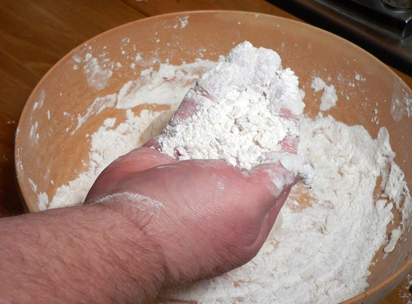 Mini Biscuits, scoop some flour.