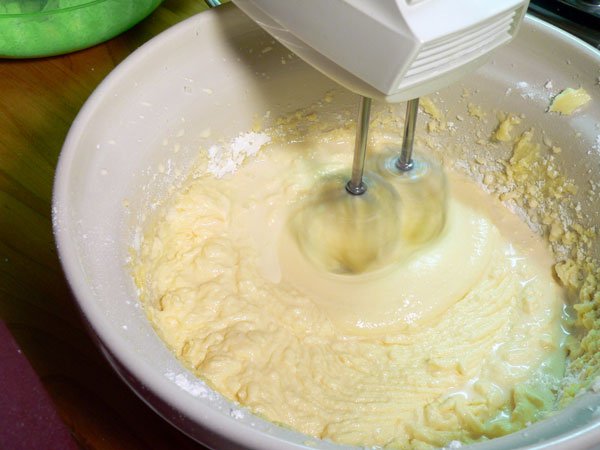 Basic Cake Layers, mix in the milk.