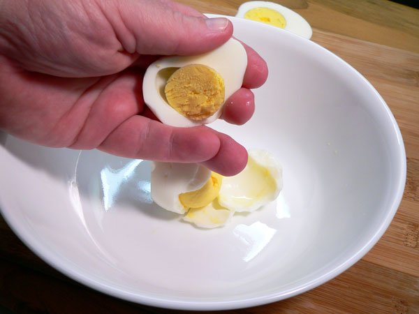 Deviled Eggs, gently squeeze.